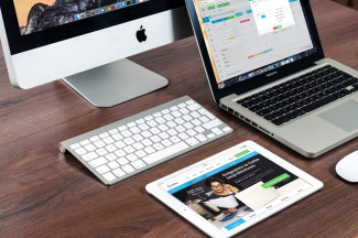 webpages open in mac, tab and laptop