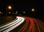 Busy freeway traffic at night. Credit: Jake Givens, Unsplash